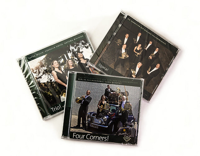 A collection of music CDs for oboe and french horn enthusiasts