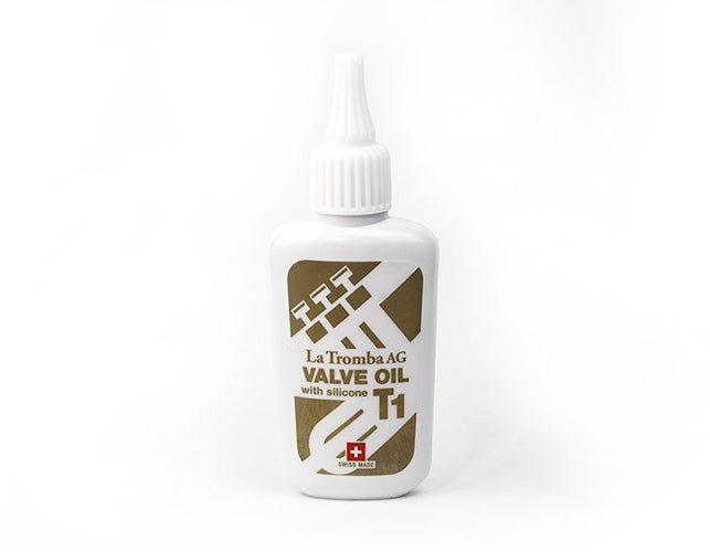 La Tromba T1 Valve Oil bottle on a clean surface, suitable for oboe and French horn valve maintenance.