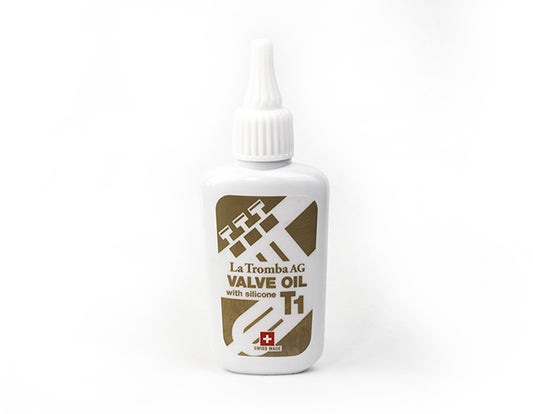 La Tromba T1 Valve Oil bottle on a clean surface, suitable for oboe and French horn valve maintenance.