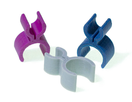 A close-up view of the Pencil Clip, a practical accessory for oboe and french horn enthusiasts.