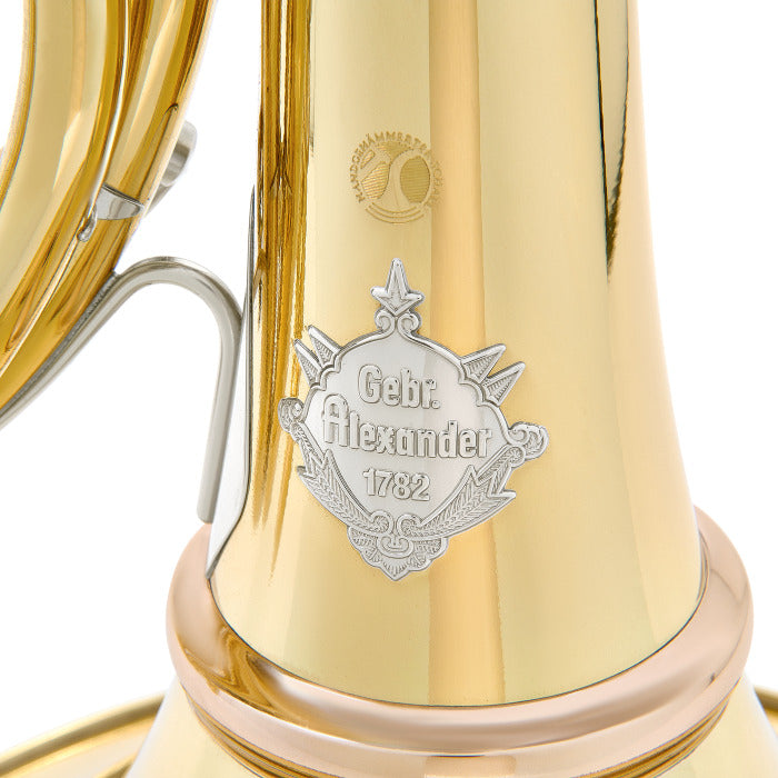 Close-up of the Gebr. Alexander 1782 crest and hand-hammered mark on the bell of the Model 1106